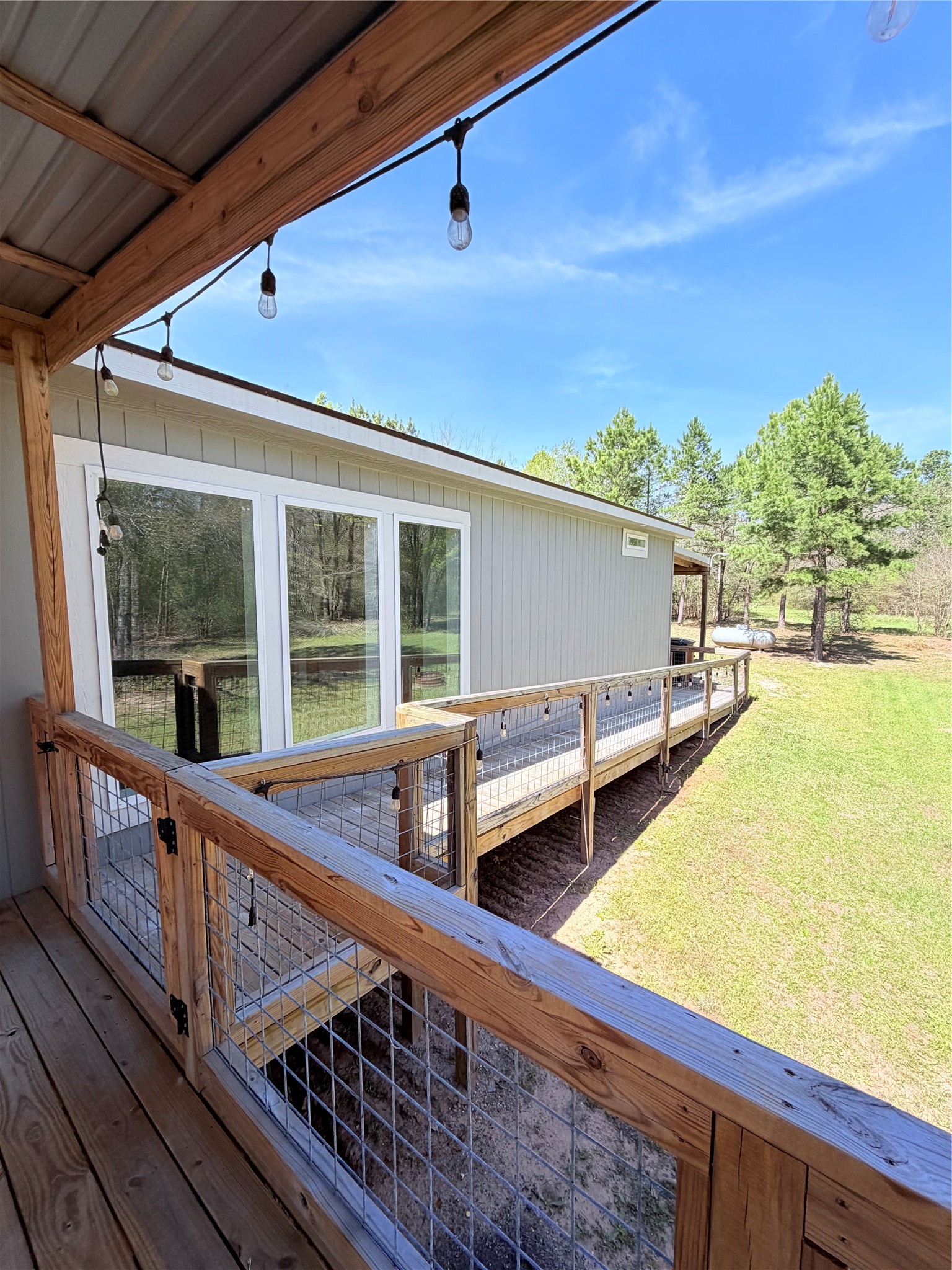 59 Forgotten Road Richards, TX 77873 - Photo 10 of 21 a view of a balcony with chairs