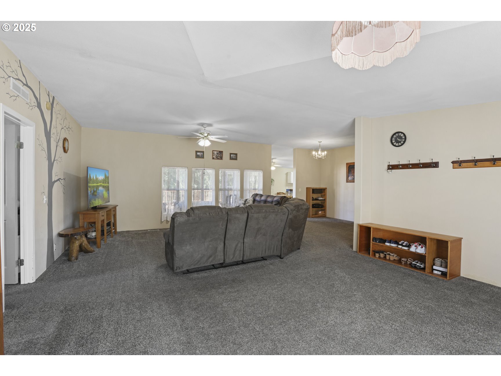 75280 Fern Hill Road Rainier, OR 97048 - Photo 4 of 30 a living room with furniture and a flat screen tv