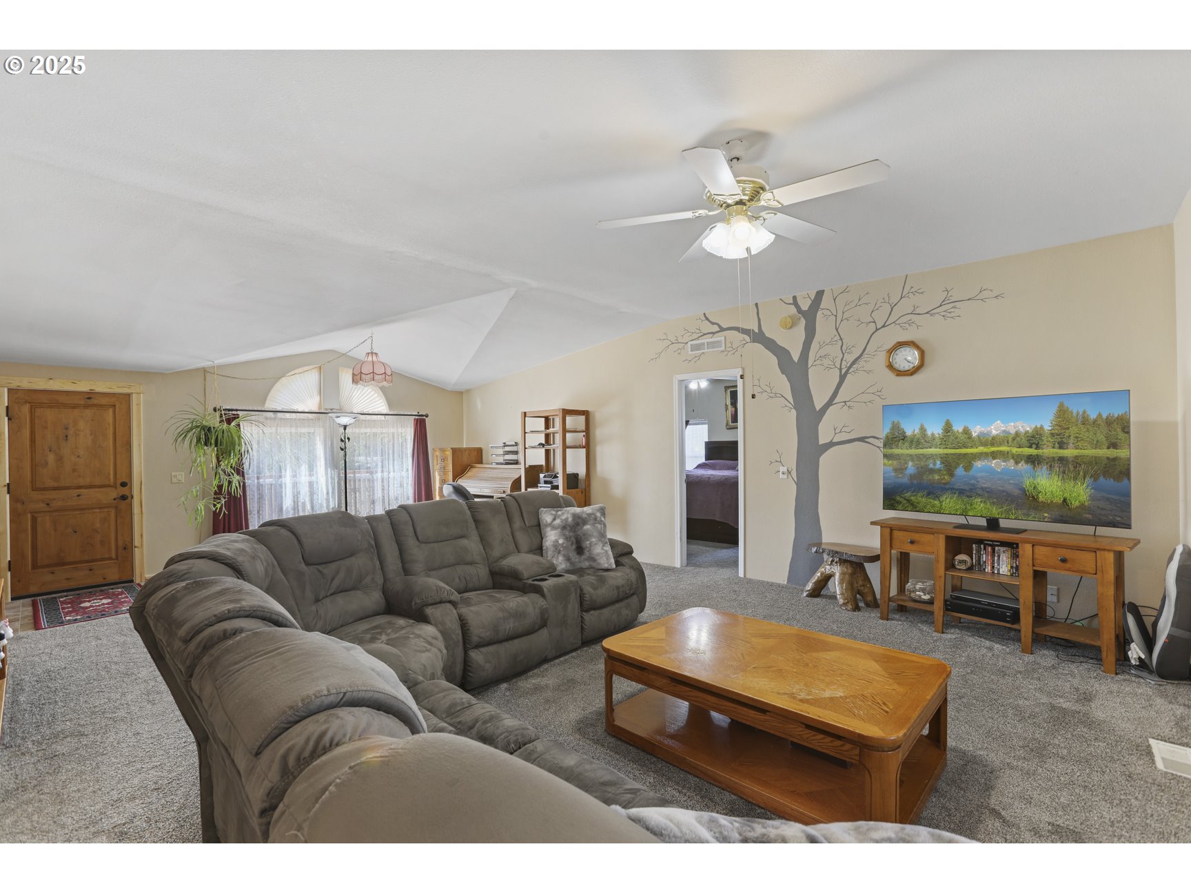 75280 Fern Hill Road Rainier, OR 97048 - Photo 8 of 30 a living room with furniture and a flat screen tv
