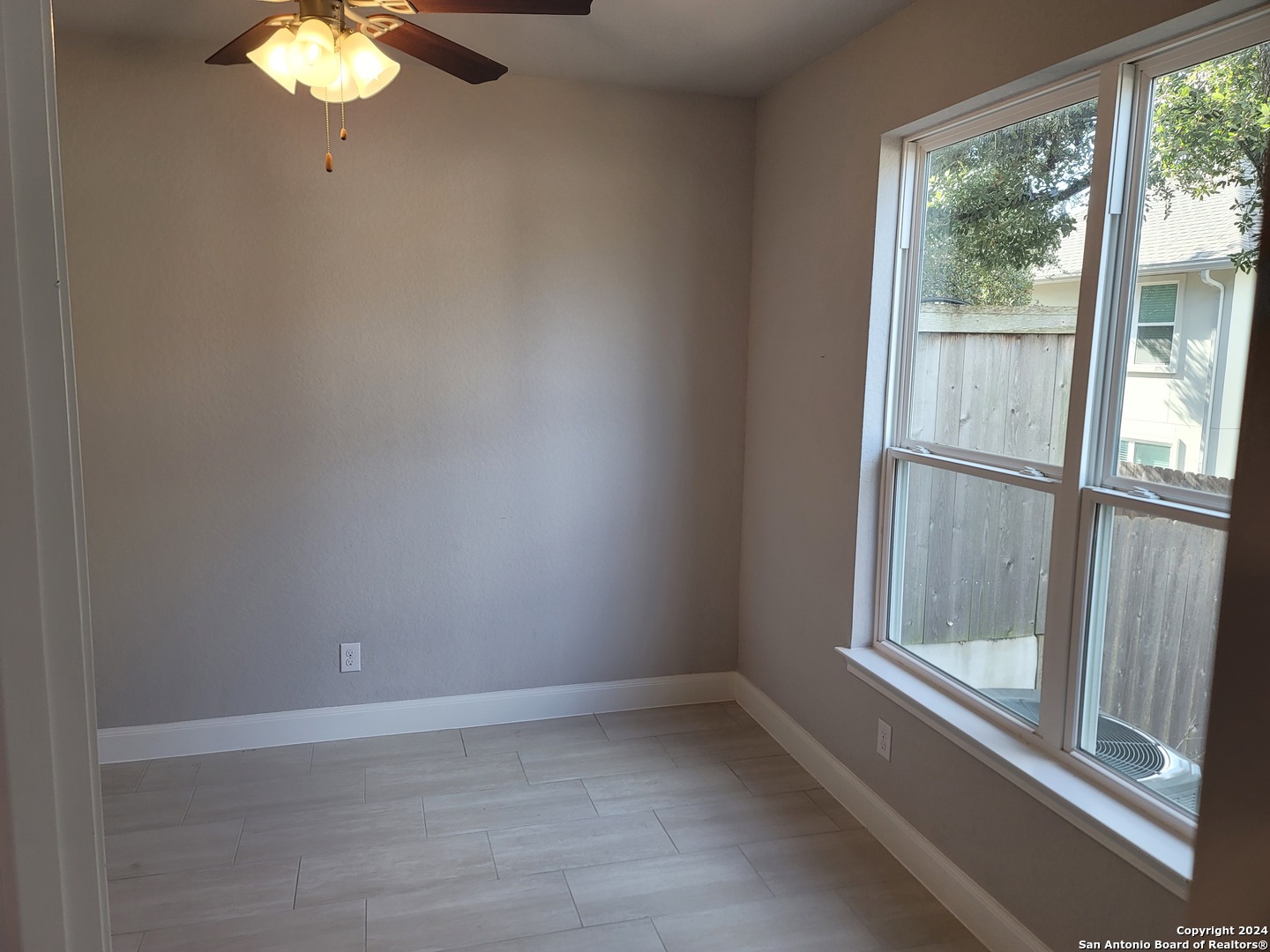 155 Magnolia Circle Boerne, TX 78006 - Photo 7 of 15 a view of an empty room with a window
