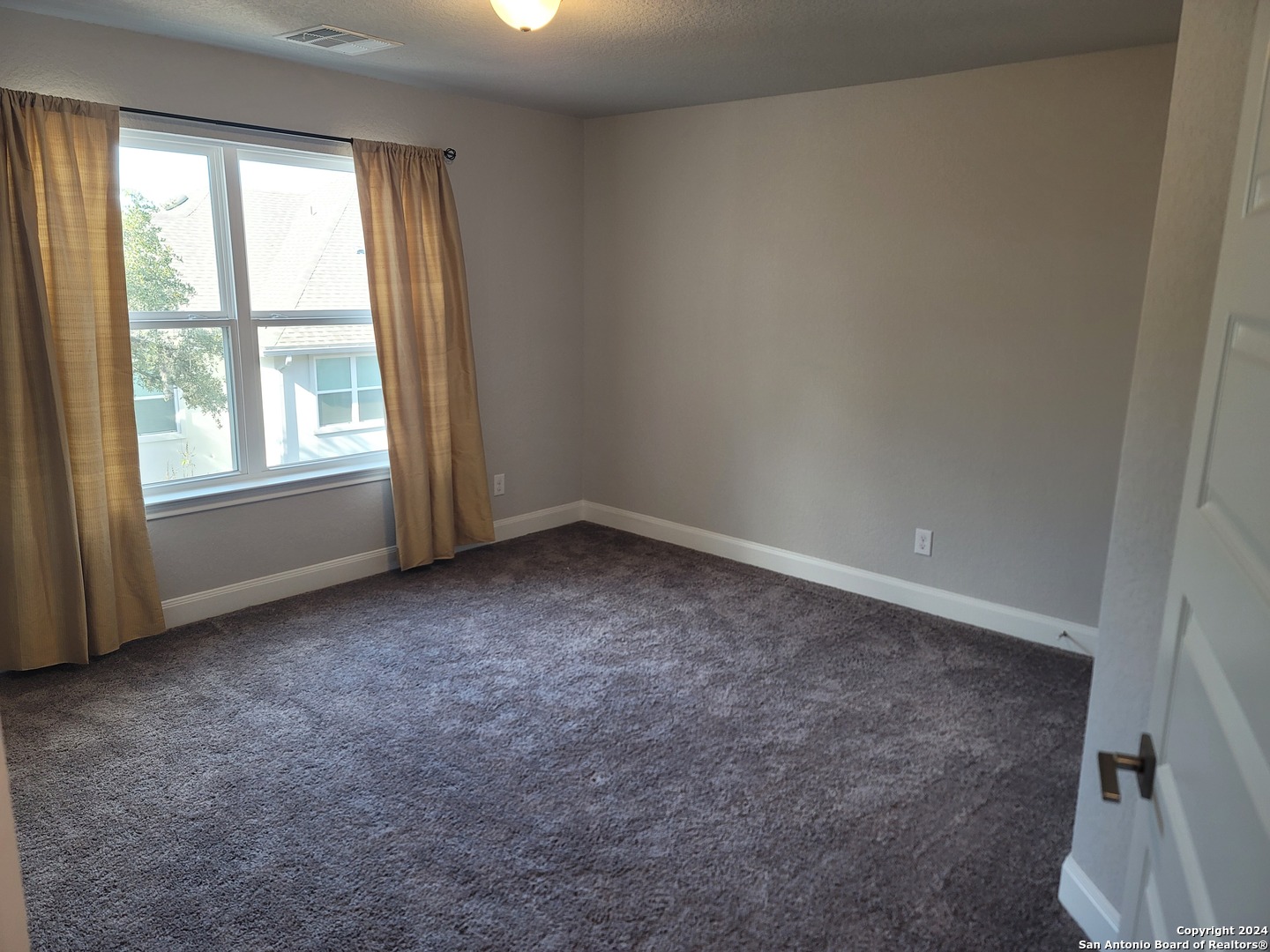155 Magnolia Circle Boerne, TX 78006 - Photo 10 of 15 an empty room with a window