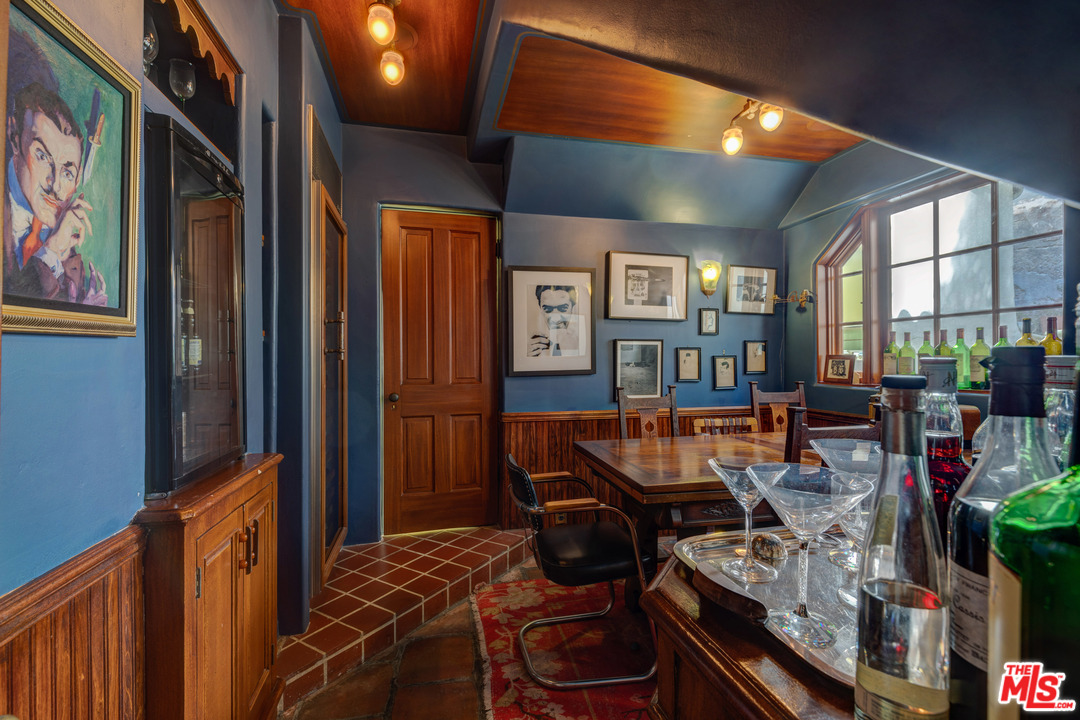 6740 Milner Road Los Angeles, CA 90068 - Photo 12 of 34 a living room with furniture and a bookshelf