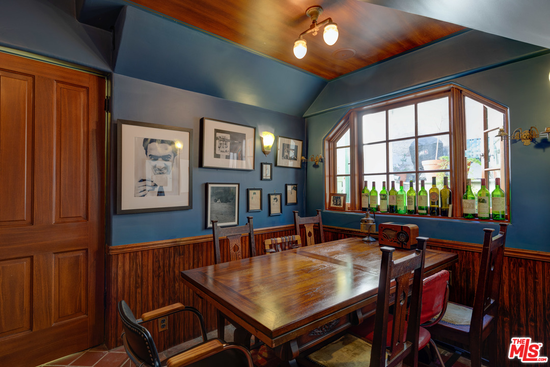 6740 Milner Road Los Angeles, CA 90068 - Photo 13 of 34 a dining room with furniture and window
