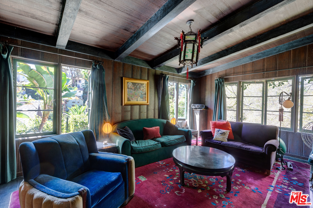 6740 Milner Road Los Angeles, CA 90068 - Photo 15 of 34 a living room with furniture a ceiling fan and a window