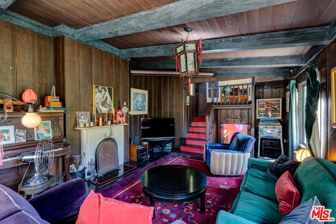 6740 Milner Road Los Angeles, CA 90068 - Photo 16 of 34 a living room filled with furniture and a fireplace