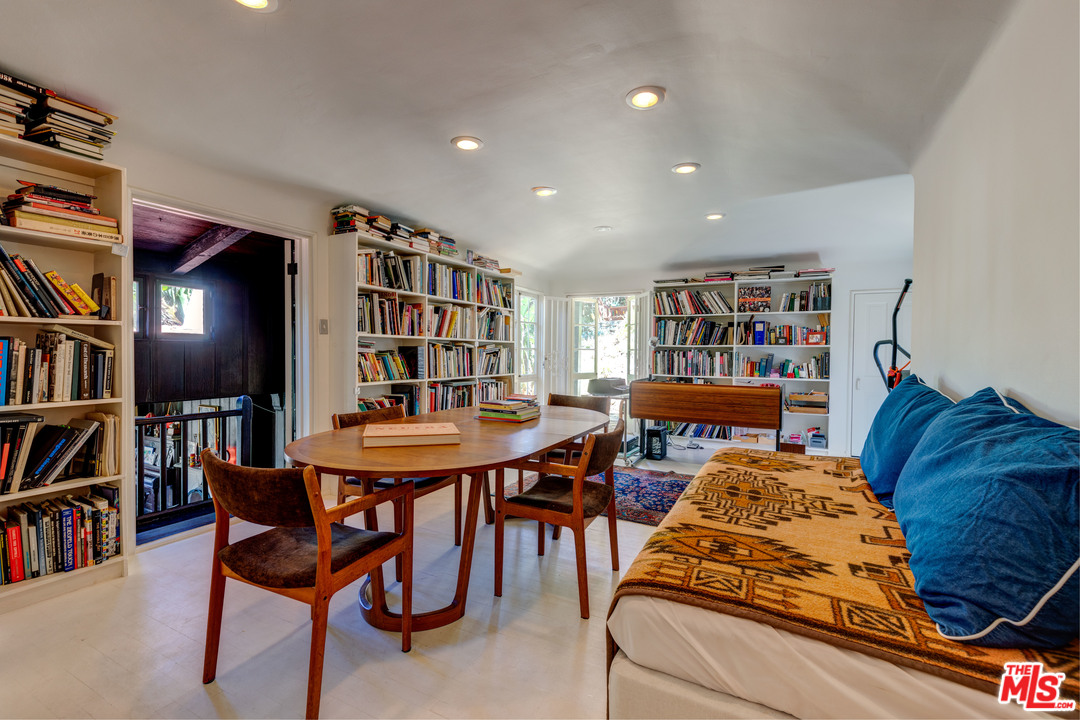 6740 Milner Road Los Angeles, CA 90068 - Photo 18 of 34 a living room with furniture and a book shelf