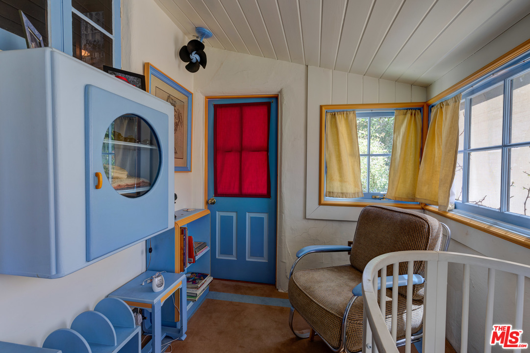 6740 Milner Road Los Angeles, CA 90068 - Photo 22 of 34 a living room with furniture and a window