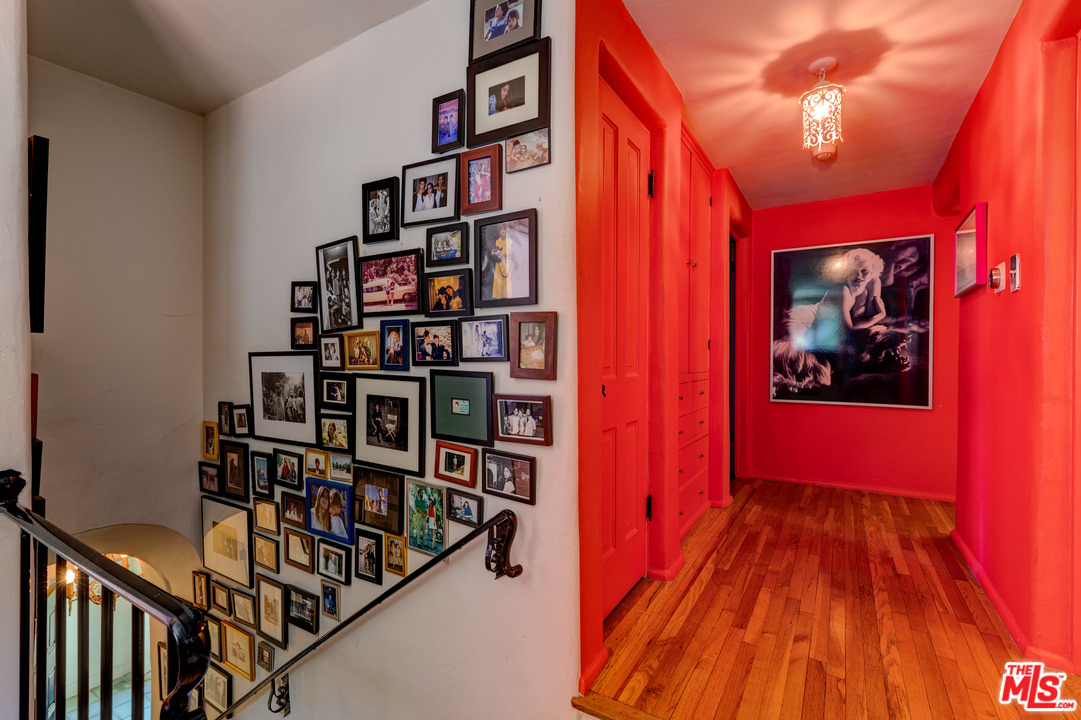 6740 Milner Road Los Angeles, CA 90068 - Photo 28 of 34 a view of a hallway with wooden floor and stairs