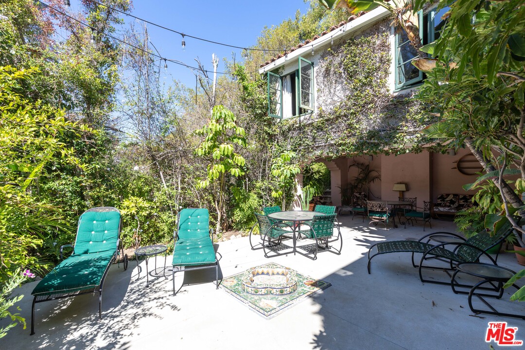 6740 Milner Road Los Angeles, CA 90068 - Photo 30 of 34 a view of backyard with outdoor seating and plants