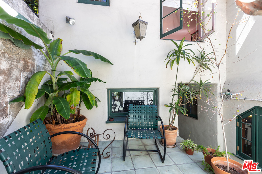 6740 Milner Road Los Angeles, CA 90068 - Photo 33 of 34 a view of entryway with flower plants