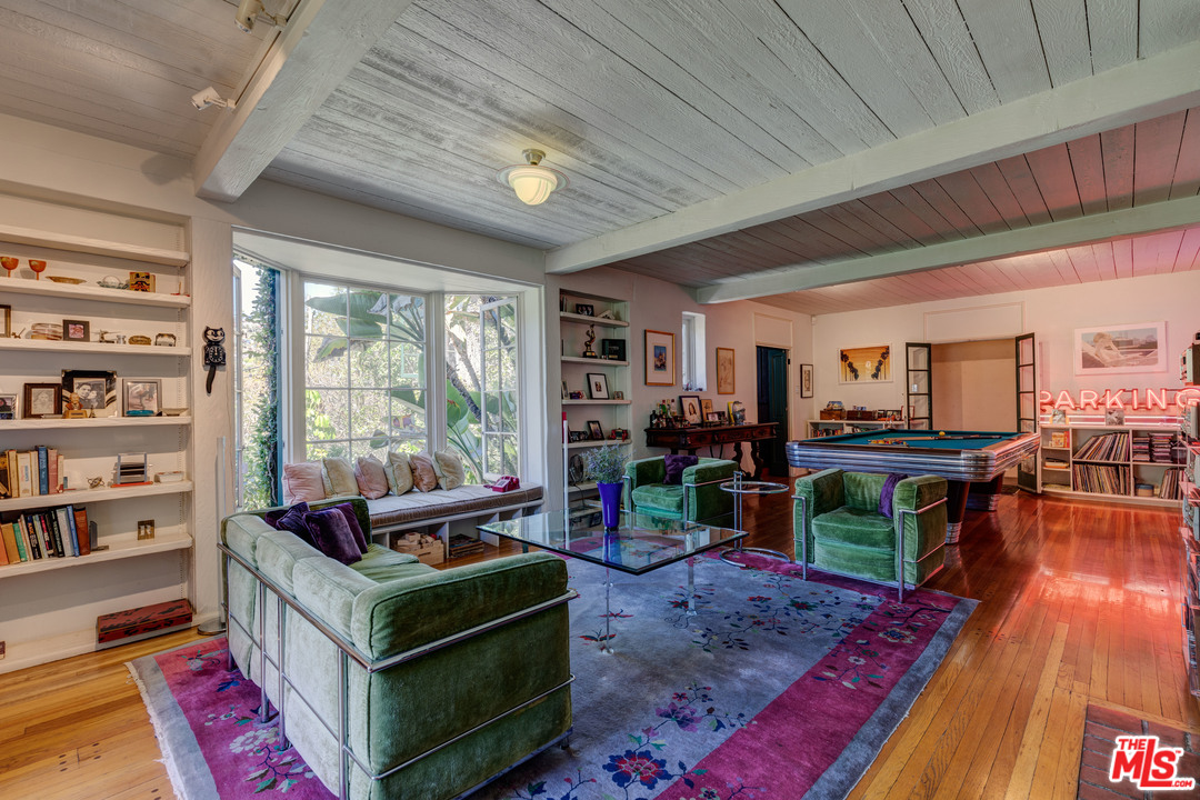 6740 Milner Road Los Angeles, CA 90068 - Photo 5 of 34 a living room with furniture and a wooden floor