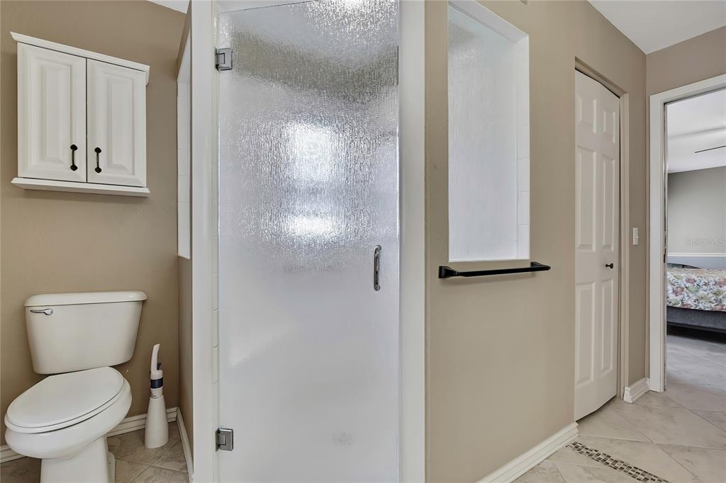 2587 Crystal Lake Drive Spring Hill, FL 34606 - Photo 18 of 63 a bathroom with a toilet