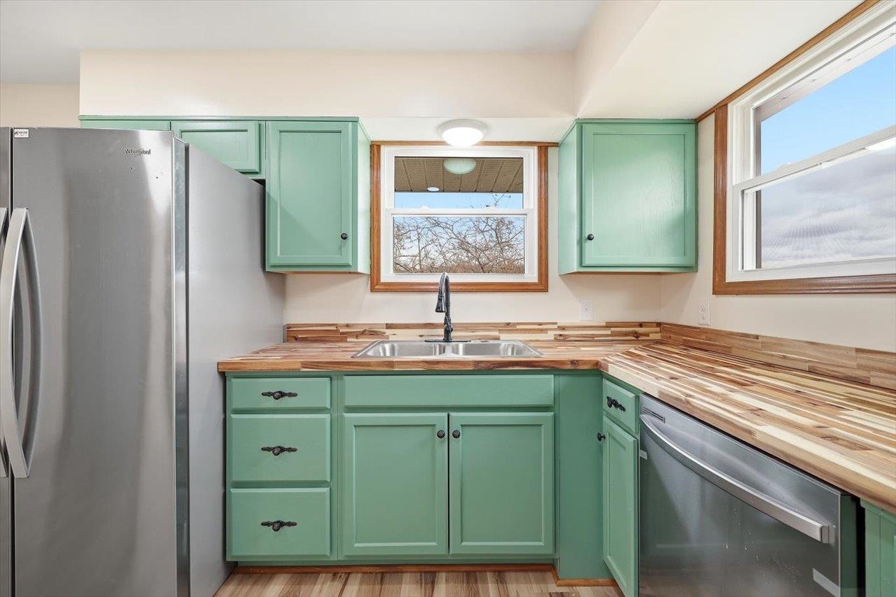 11 Partlow Street Staunton, VA 24401 - Photo 11 of 38 a kitchen with a refrigerator and a sink