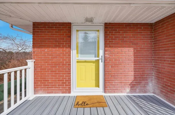 a view of a brick house with a door