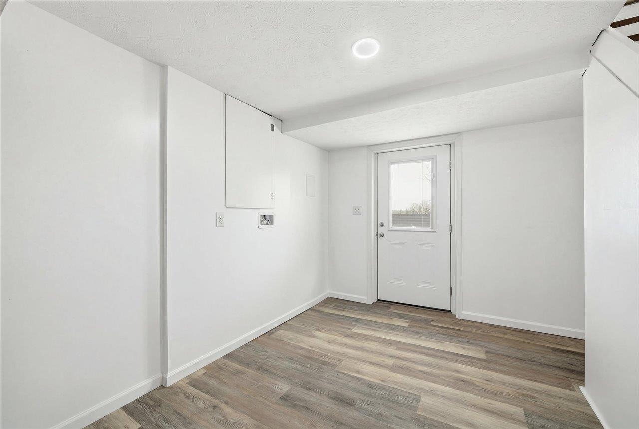 11 Partlow Street Staunton, VA 24401 - Photo 28 of 38 a view of an empty room with wooden floor