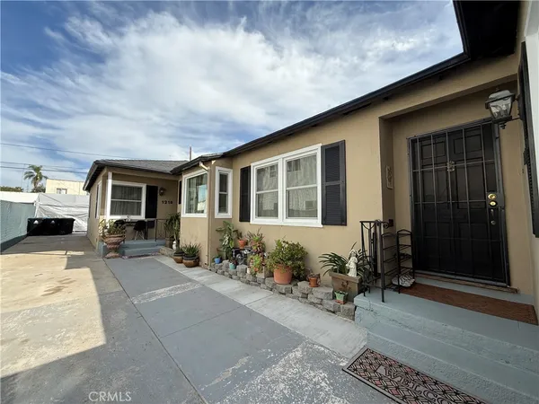 a front view of a house with outdoor space