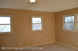 10577 Vigo Road Bagdad, KY 40003 - Photo 3 of 21 main floor bedroom with lots of windows that overlook the property