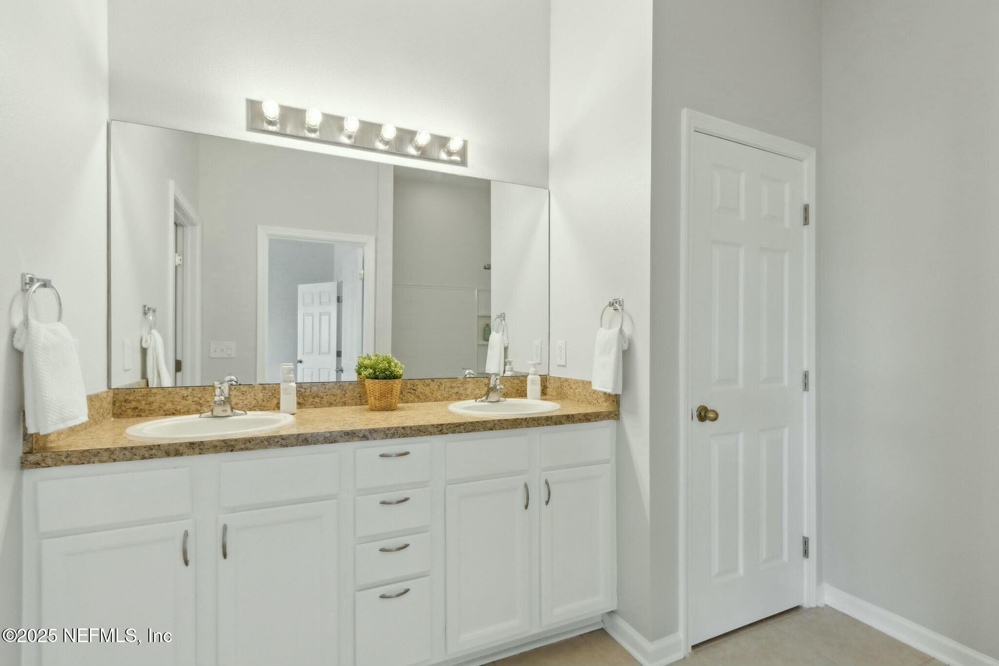 12960 Spring Rain Road Jacksonville, FL 32258 - Photo 17 of 46 Spacious bathroom with dual vanities