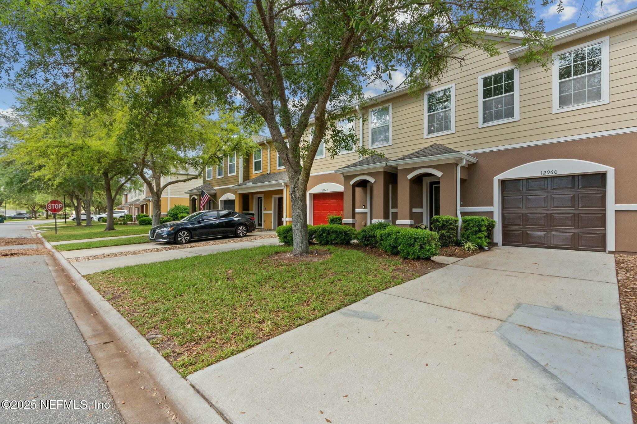 12960 Spring Rain Road Jacksonville, FL 32258 - Photo 2 of 46 Garage & ample parking