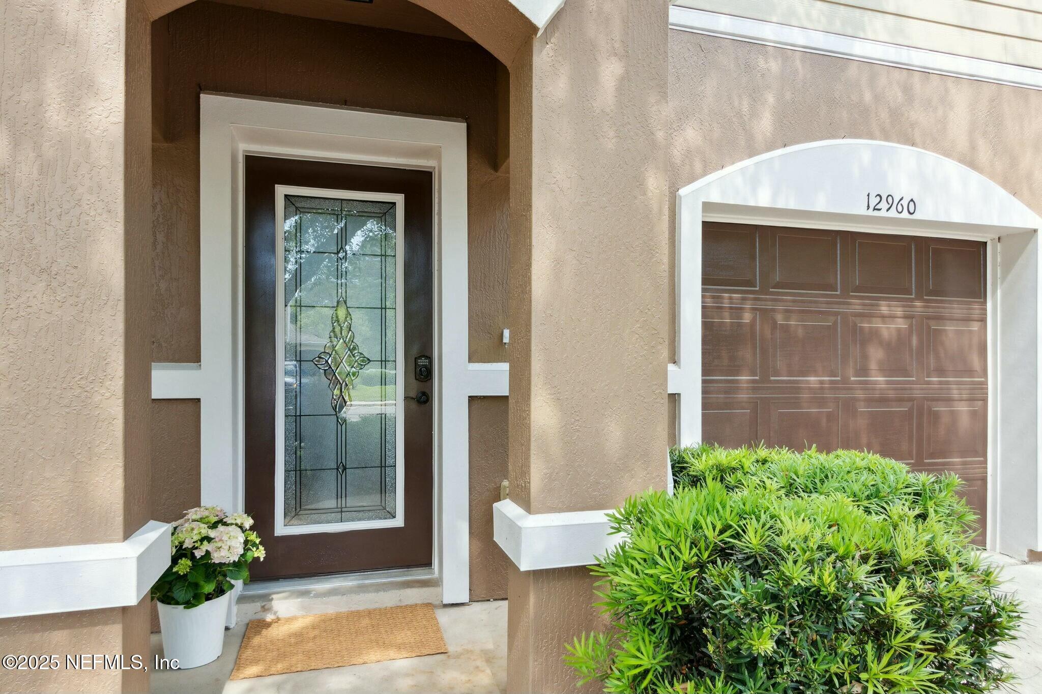 12960 Spring Rain Road Jacksonville, FL 32258 - Photo 4 of 46 Glass front door