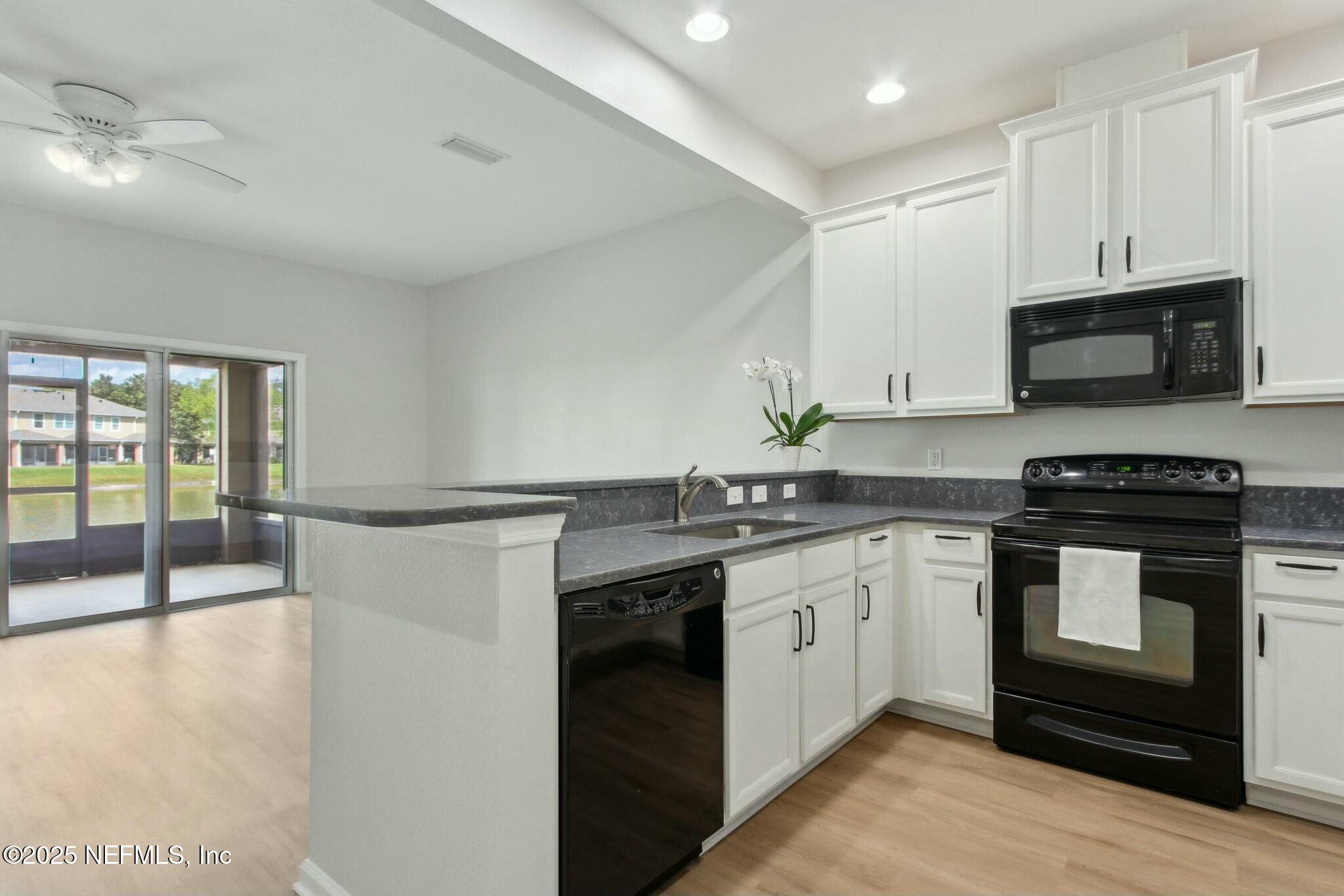 12960 Spring Rain Road Jacksonville, FL 32258 - Photo 10 of 46 Updated kitchen with 42" cabinets