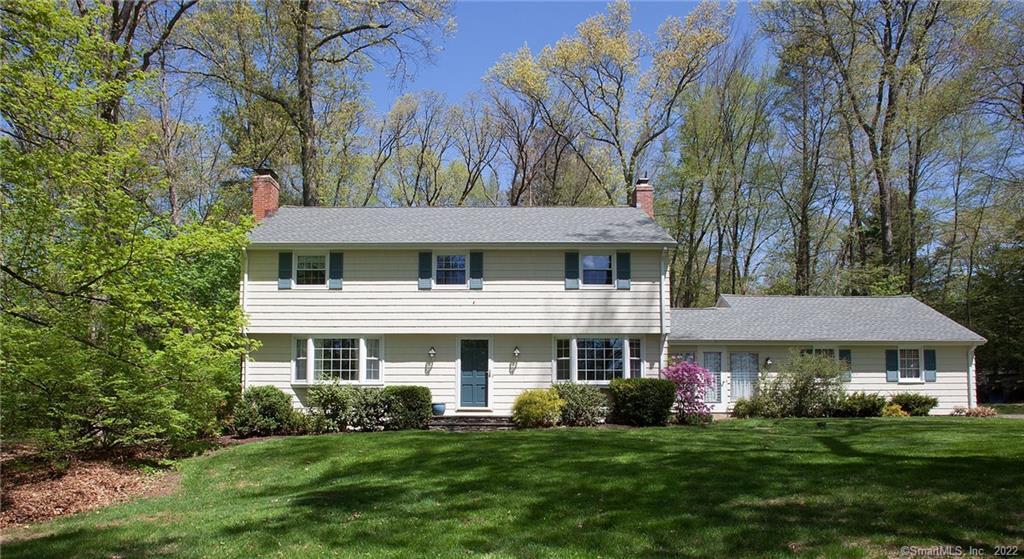 2 Stockade Road Simsbury, CT 06092 - Photo 1 of 1 a front view of a house with a garden