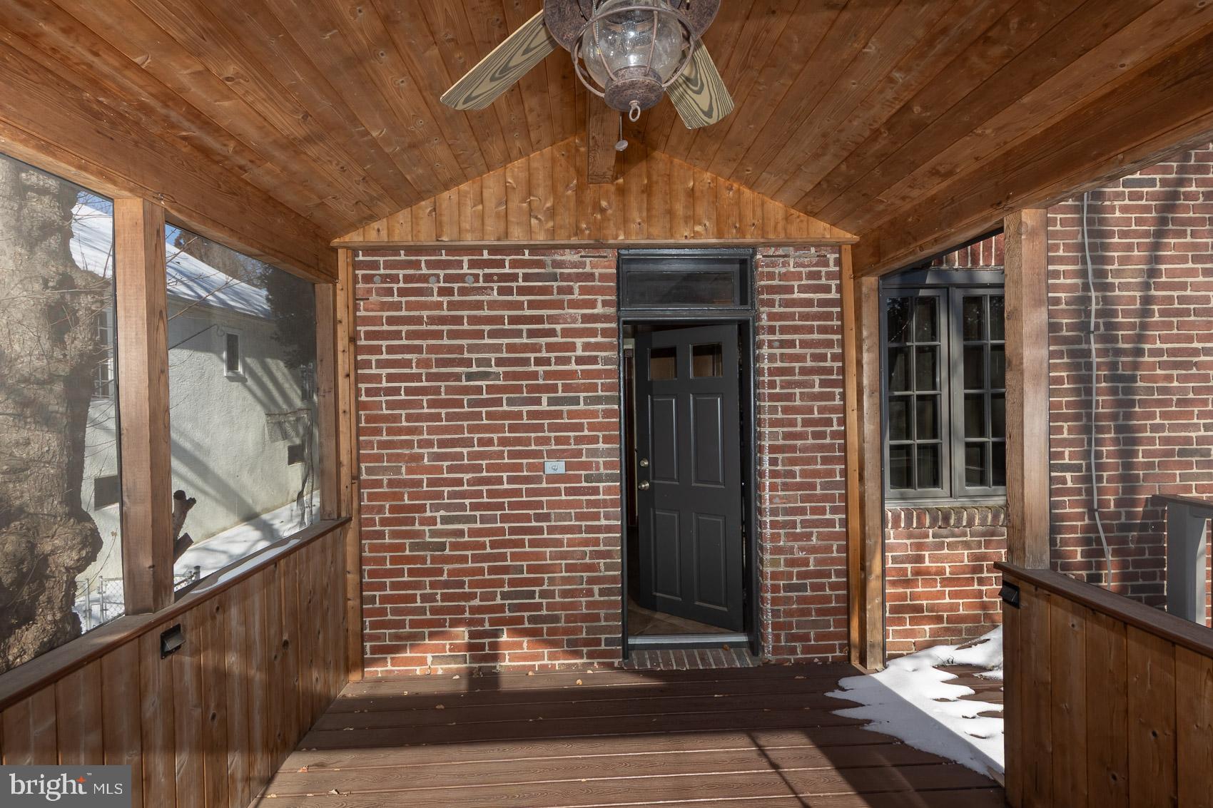 613 Anneslie Road Baltimore, MD 21212 - Photo 15 of 48 a view of a porch with a door