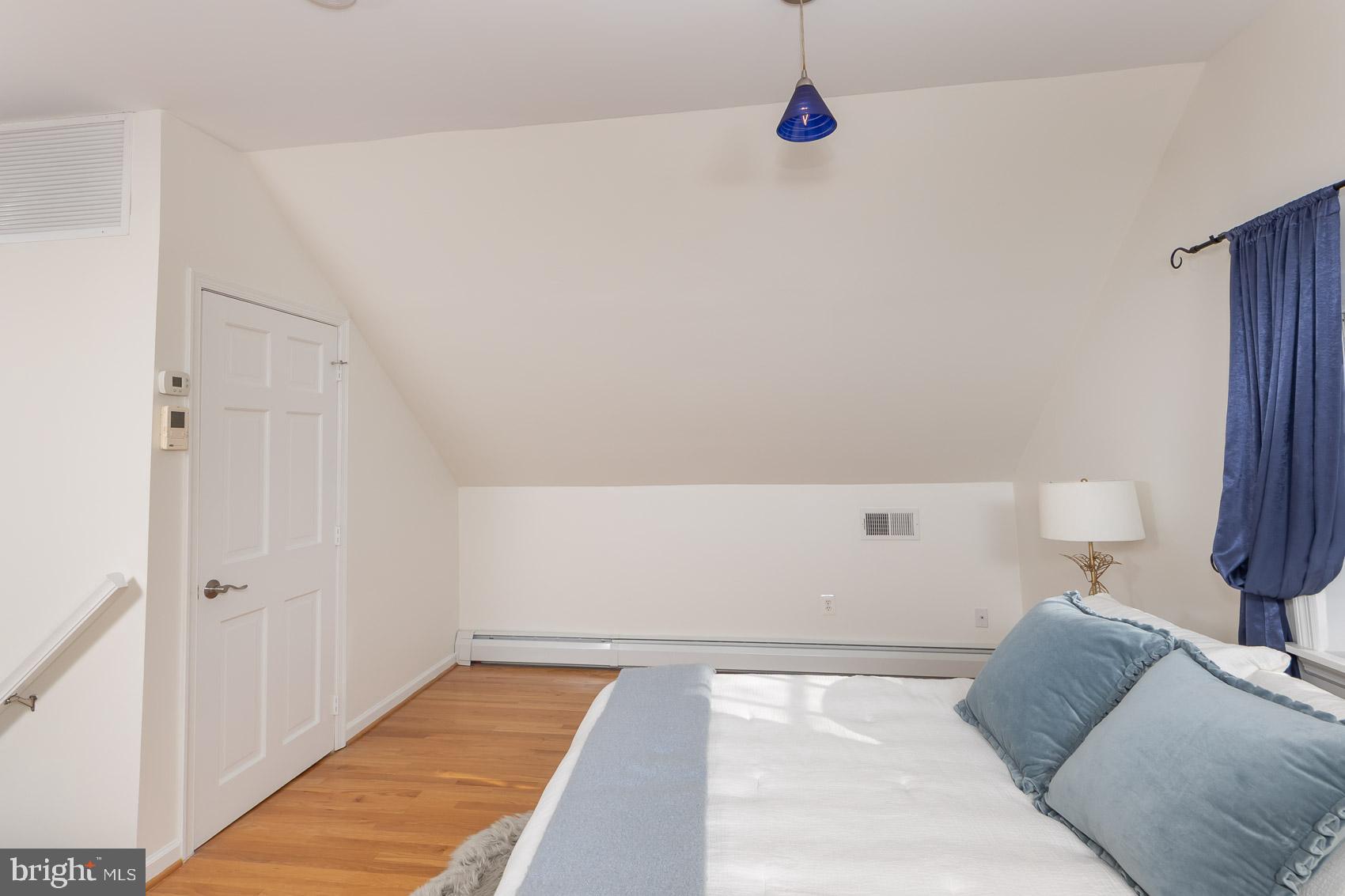 613 Anneslie Road Baltimore, MD 21212 - Photo 17 of 48 a bedroom with a bed and a rug