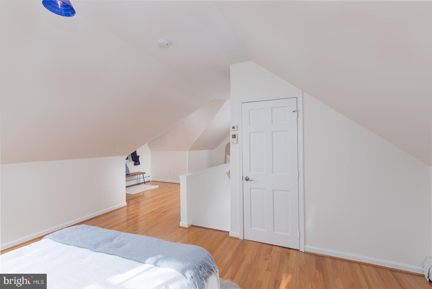 613 Anneslie Road Baltimore, MD 21212 - Photo 18 of 48 a view of a bedroom with wooden floor