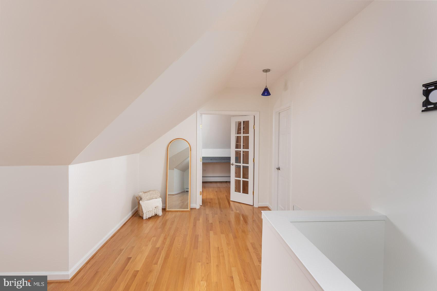 613 Anneslie Road Baltimore, MD 21212 - Photo 20 of 48 a view of a bedroom with wooden floor