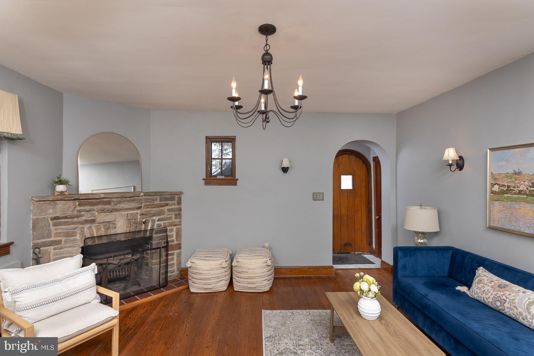 613 Anneslie Road Baltimore, MD 21212 - Photo 2 of 48 a living room with furniture and a fireplace