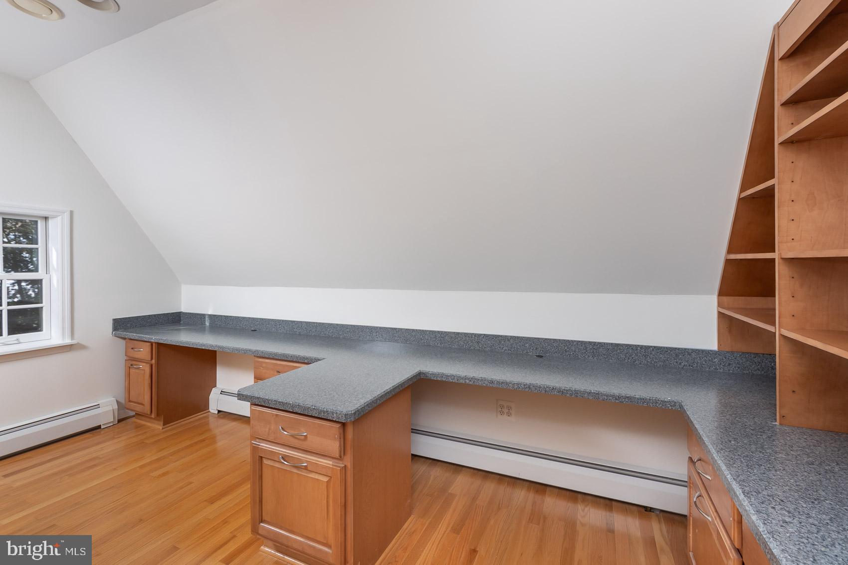 613 Anneslie Road Baltimore, MD 21212 - Photo 22 of 48 a hallway with closet with wooden floor