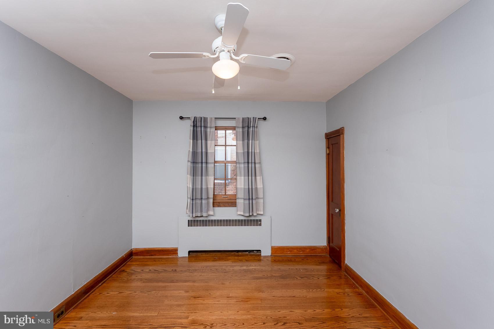613 Anneslie Road Baltimore, MD 21212 - Photo 29 of 48 an empty room with windows and closet