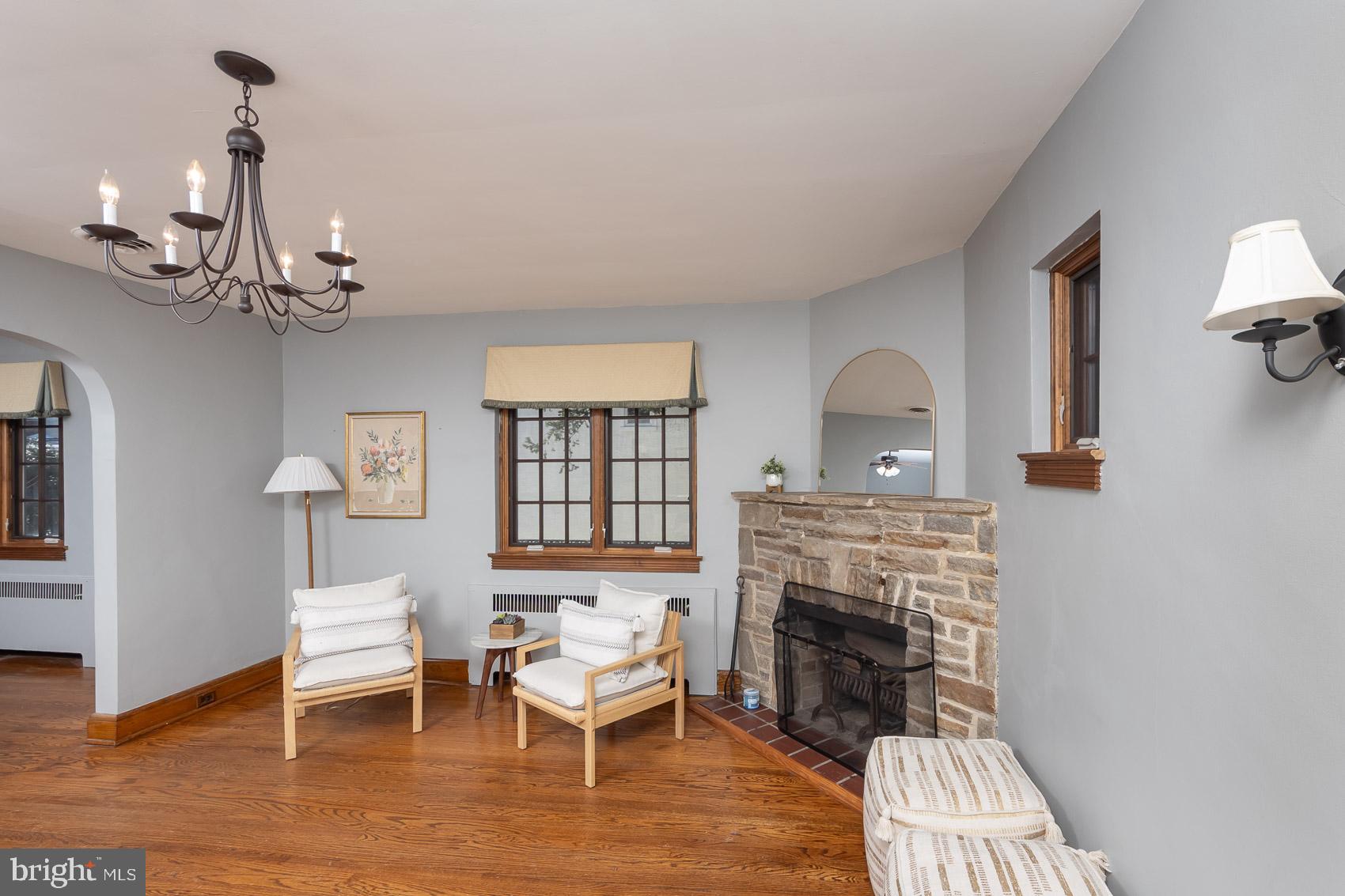 613 Anneslie Road Baltimore, MD 21212 - Photo 4 of 48 a living room with furniture and a fireplace