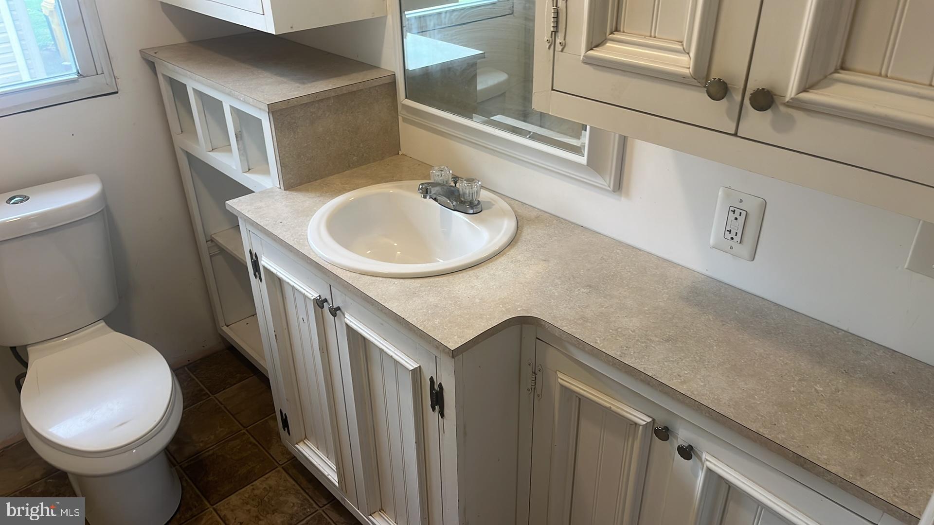 1704 Twickenham Road Pasadena, MD 21122 - Photo 11 of 19 Bright and airy bathroom with modern finishes.