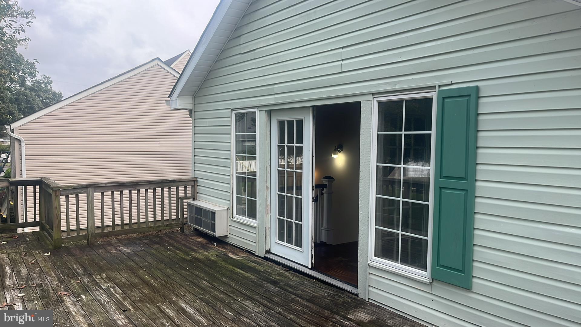 1704 Twickenham Road Pasadena, MD 21122 - Photo 19 of 19 Charming deck with inviting entryway.