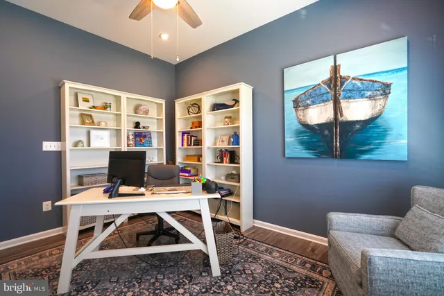 a bedroom with a bed and a table