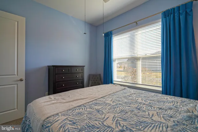 a view of a house with backyard porch and sitting area