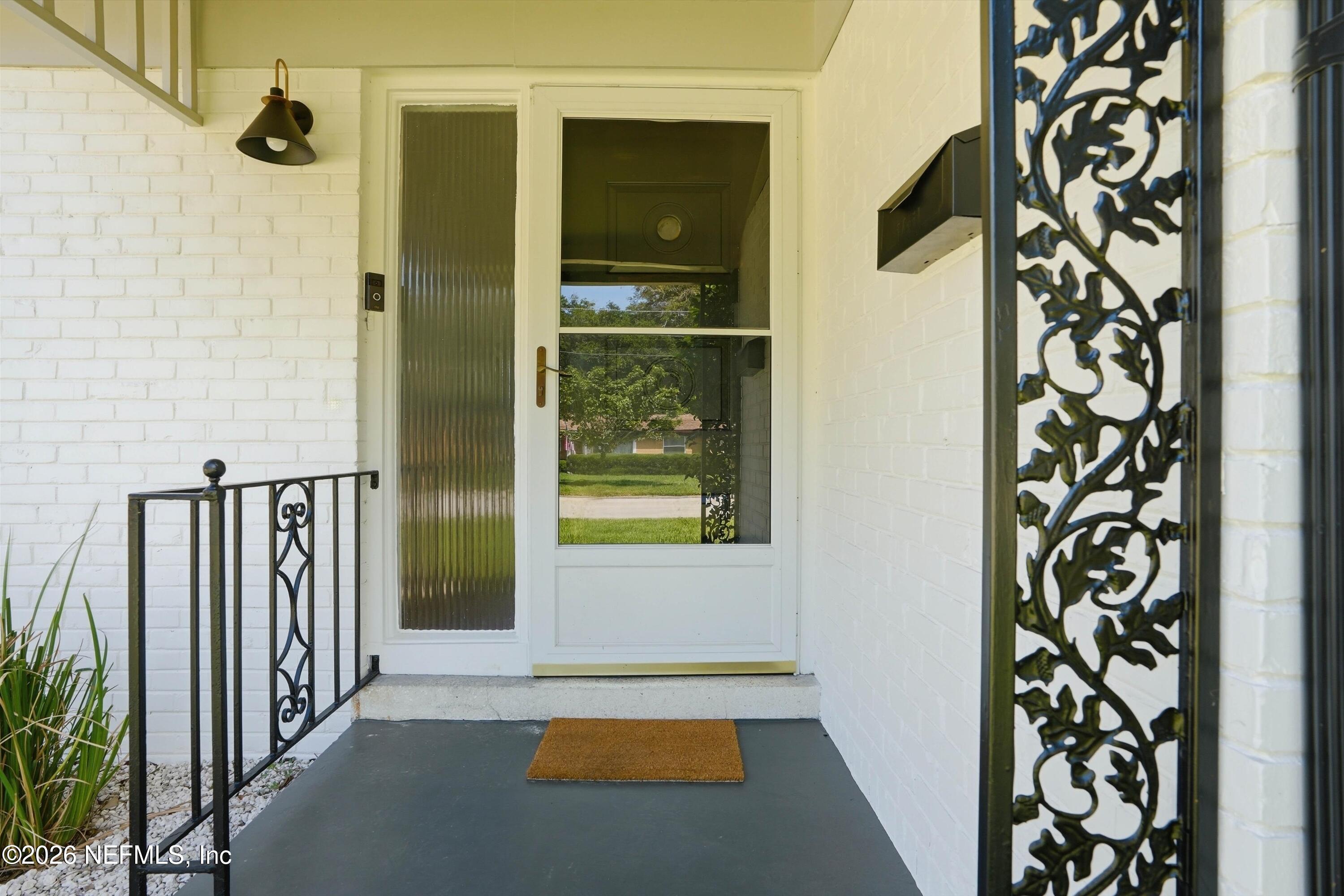 3841 Rogero Road Jacksonville, FL 32277 - Photo 2 of 30 03-Front Porch