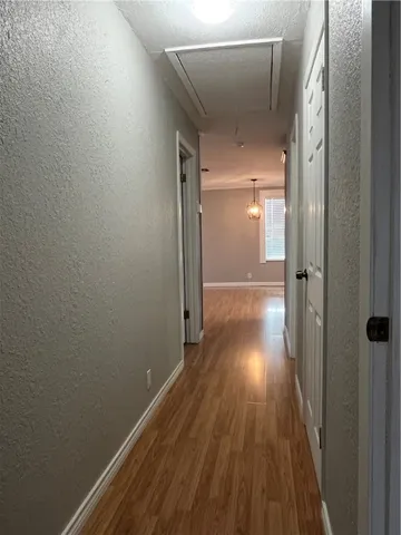 a white toilet sitting next to a bath tub