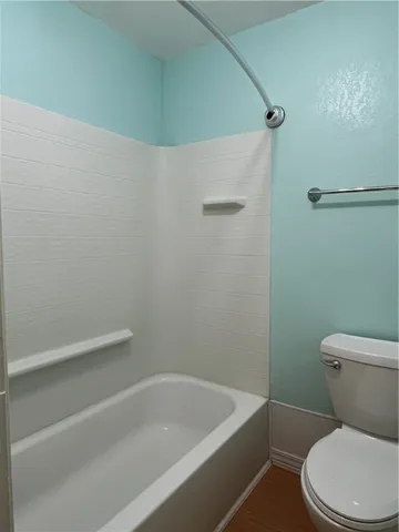 a spacious bathroom with a double vanity sink and a mirror