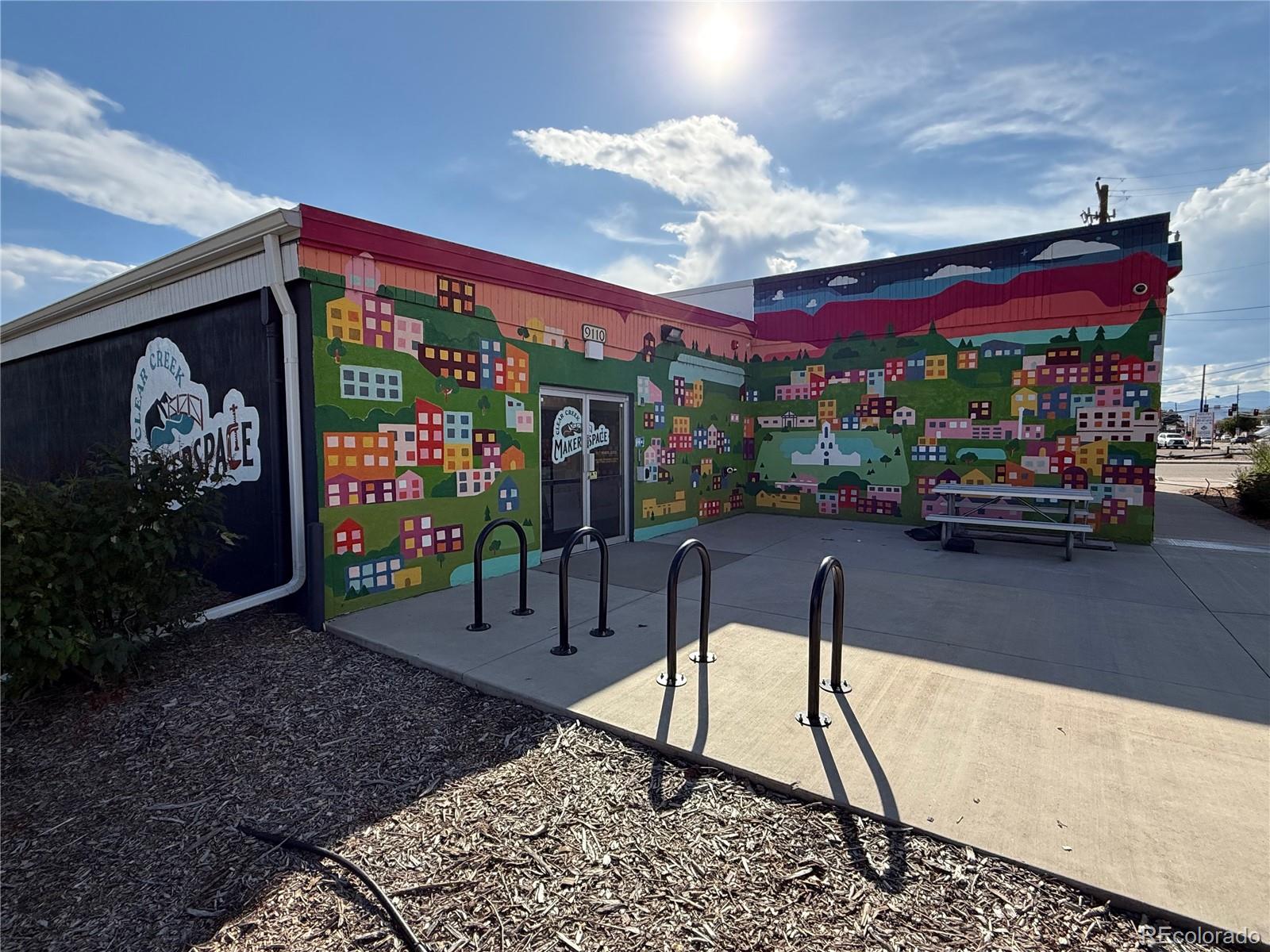 4720 Carr Street Wheat Ridge, CO 80033 - Photo 30 of 31 a view of a chairs and tables in patio