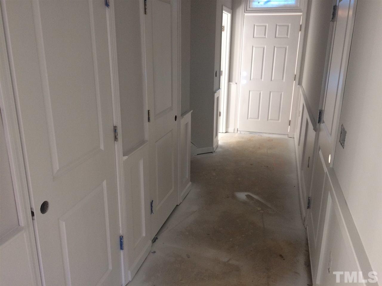 6031 Beale Loop, Unit 13 CARLTON Raleigh, NC 27616 - Photo 5 of 9 Panel trim and 2 closets