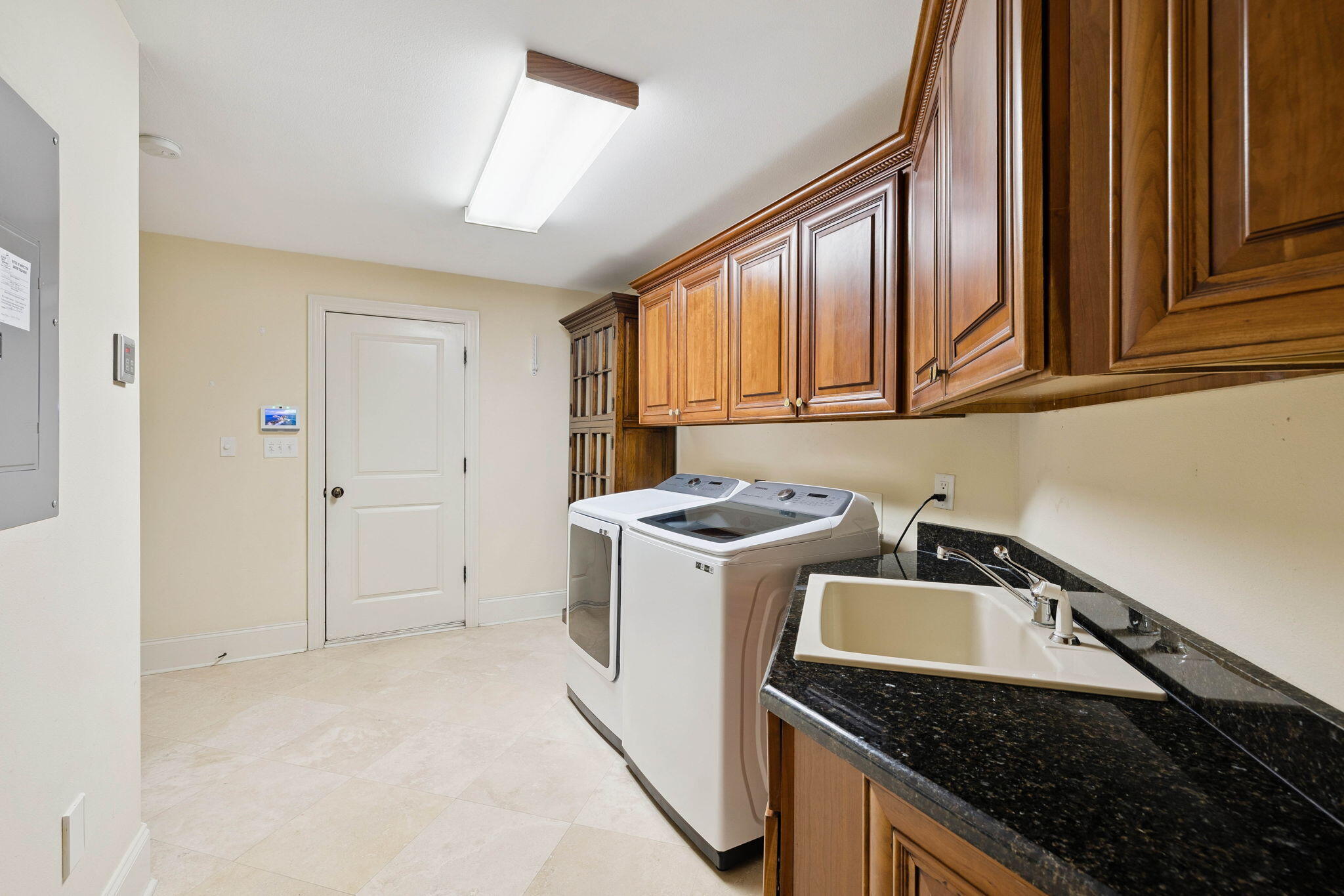 6326 Augusta Cove Destin, FL 32541 - Photo 65 of 71 68-Laundry-Room-Granite-Cabinetry