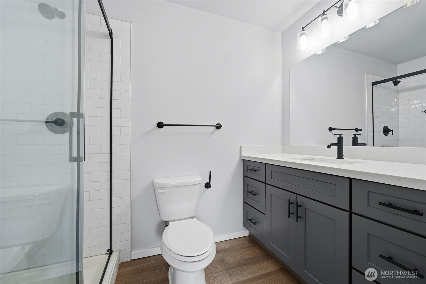 731 High Avenue Sultan, WA 98294 - Photo 15 of 37 a bathroom with a toilet sink and mirror