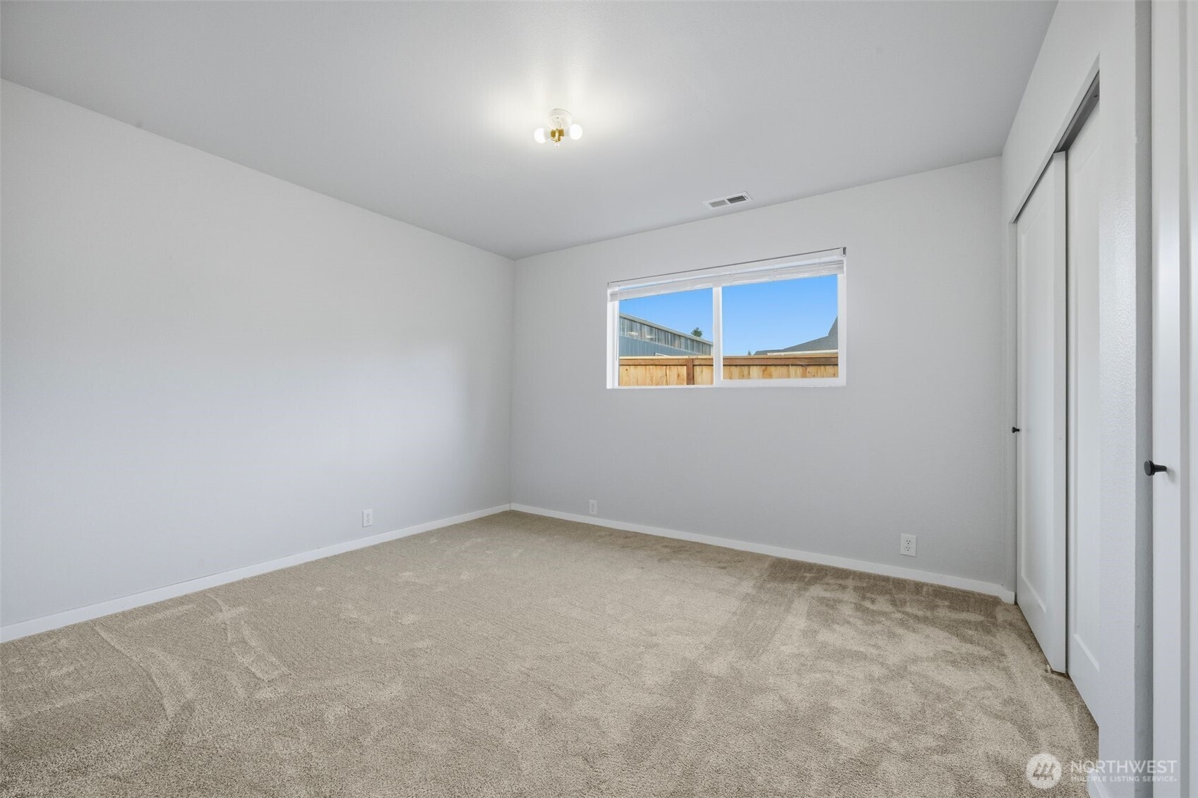 731 High Avenue Sultan, WA 98294 - Photo 16 of 37 an empty room with a window