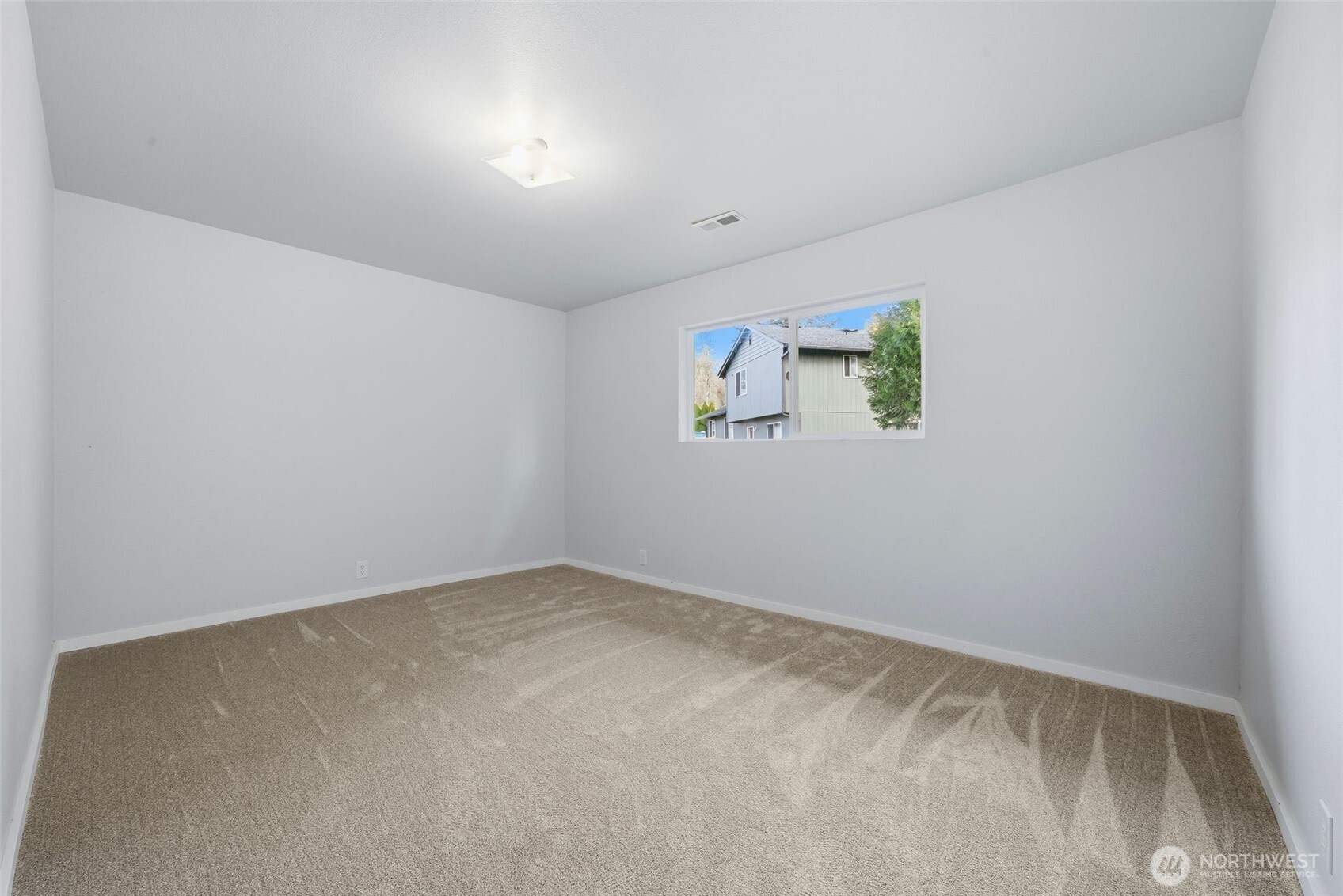 731 High Avenue Sultan, WA 98294 - Photo 17 of 37 an empty room with windows