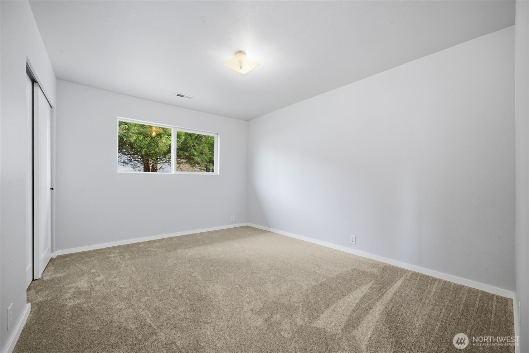 731 High Avenue Sultan, WA 98294 - Photo 19 of 37 an empty room with windows