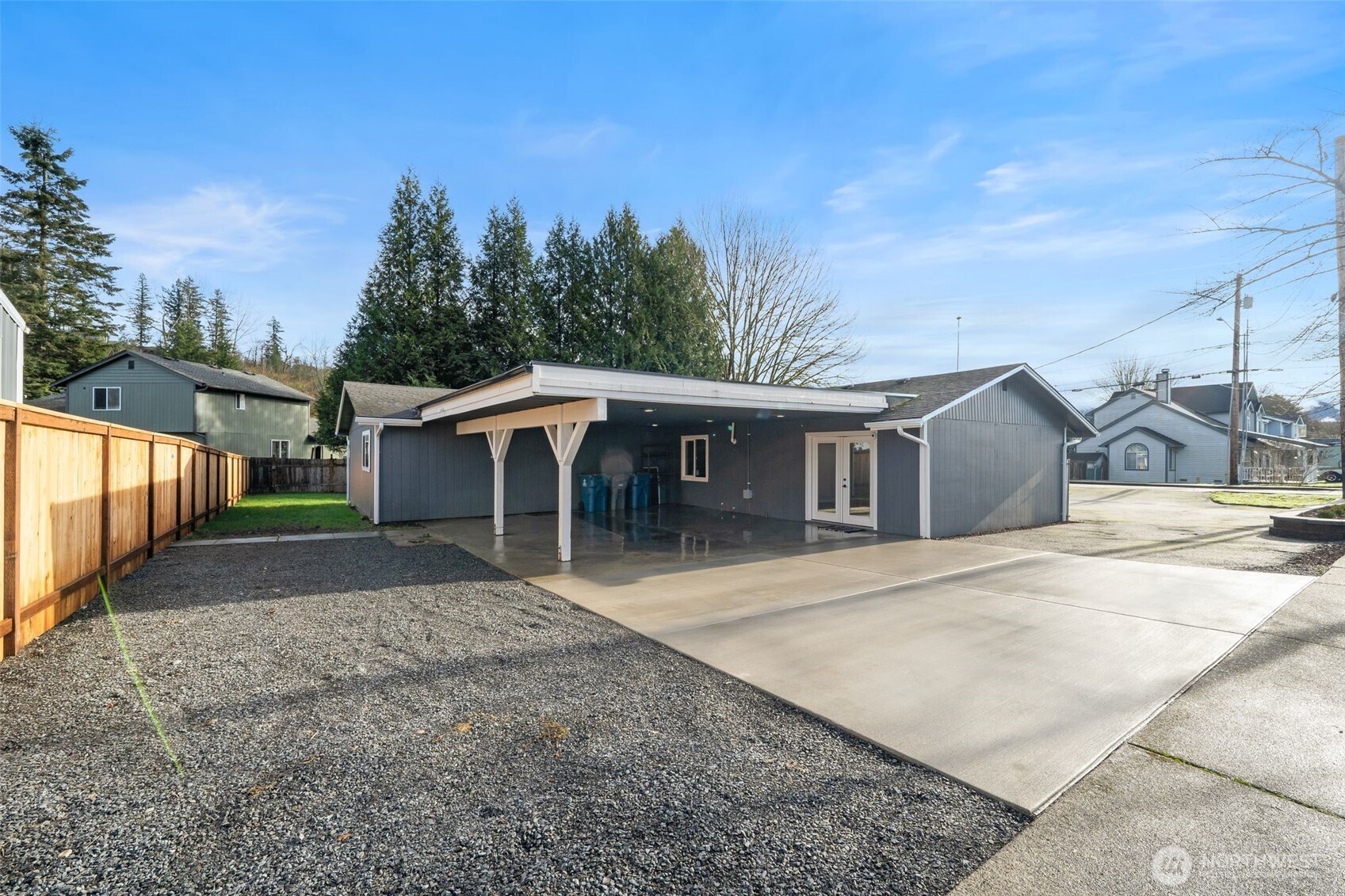 731 High Avenue Sultan, WA 98294 - Photo 24 of 37 a front view of a house with a yard and trees
