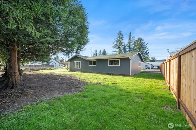 a view of a yard with tree s